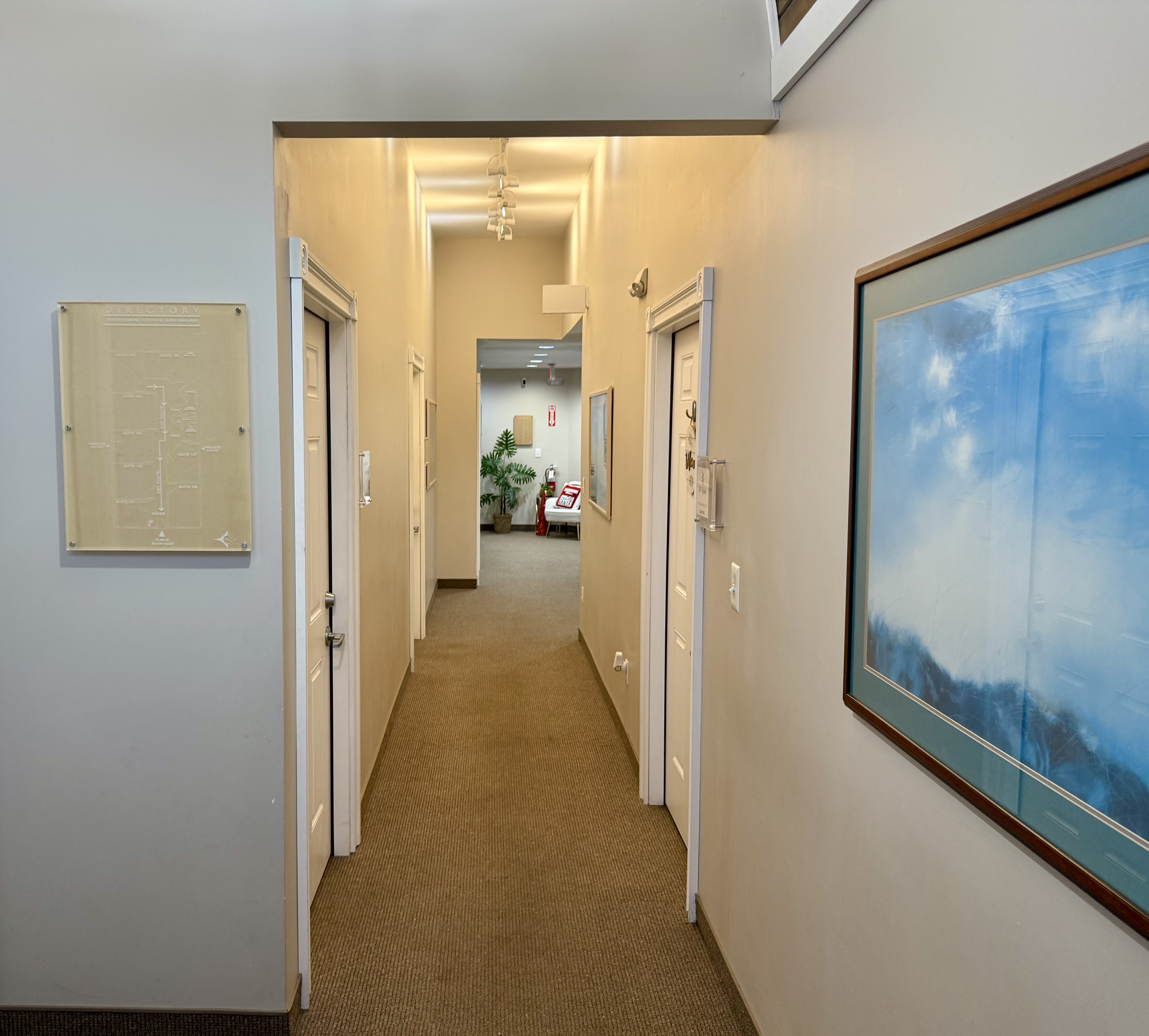 Office hallway professional lighting Barrett Properties commercial space Olathe